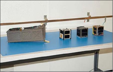 Figure 3: P-POD (left) with the three cubesats flying on the TacSat-3 mission (image credit: NASA)
