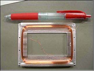 Figure 6: Comparison of the magnetic torquer with a pen (image credit: TITech)