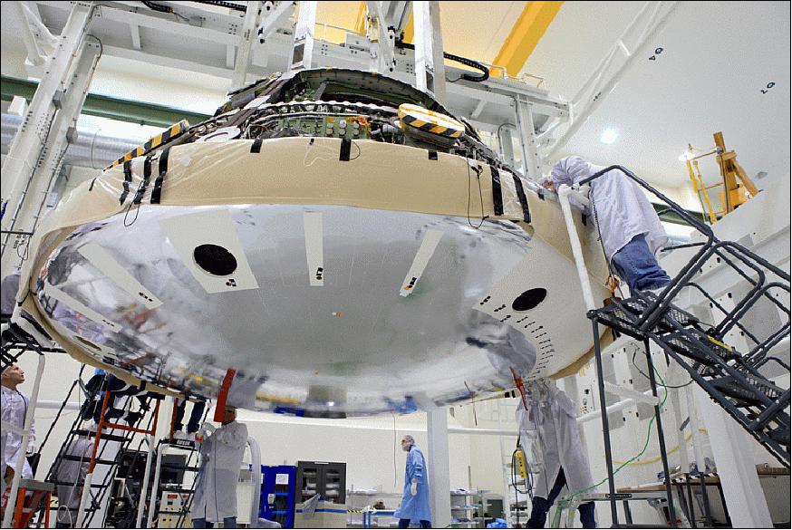 Figure 8: Photo of Orion's heat shield and crew module in position for mating operations at NASA KSC (image credit: NASA)