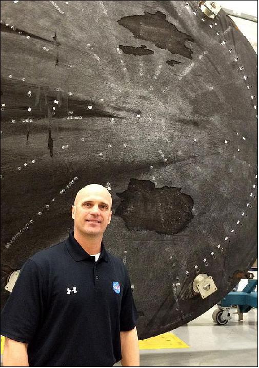 Figure 16: Larry Gagliano, Orion project manager at NASA/MSFC, photographed in front of the spaceship's heat shield (image credit: Lee Roop, AL.com)