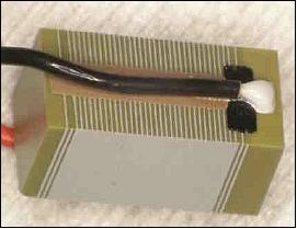 Figure 19: Top view of 5 mm x 5 mm 10 mm multilayer piezo component (image credit: CNRS /LATMOS)