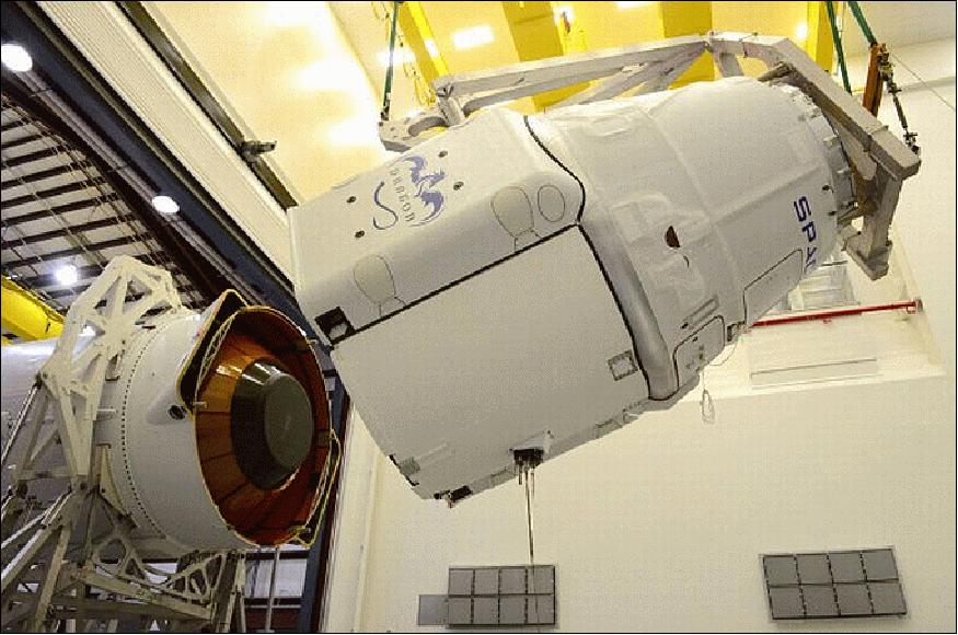 Figure 28: The Dragon spacecraft, filled with about 2090 kg of cargo bound for the space station, is mated with the Falcon 9 launcher (image credit: SpaceX) 54)