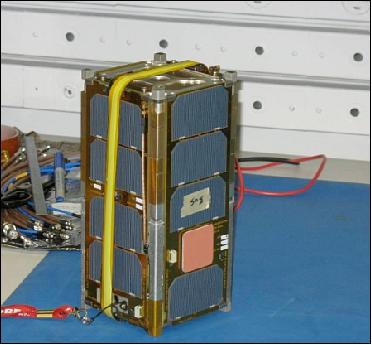 Figure 5: Photo of LMRST-Sat with the antennas wrapped around the nanosatellite (image credit: SSDL, JPL)