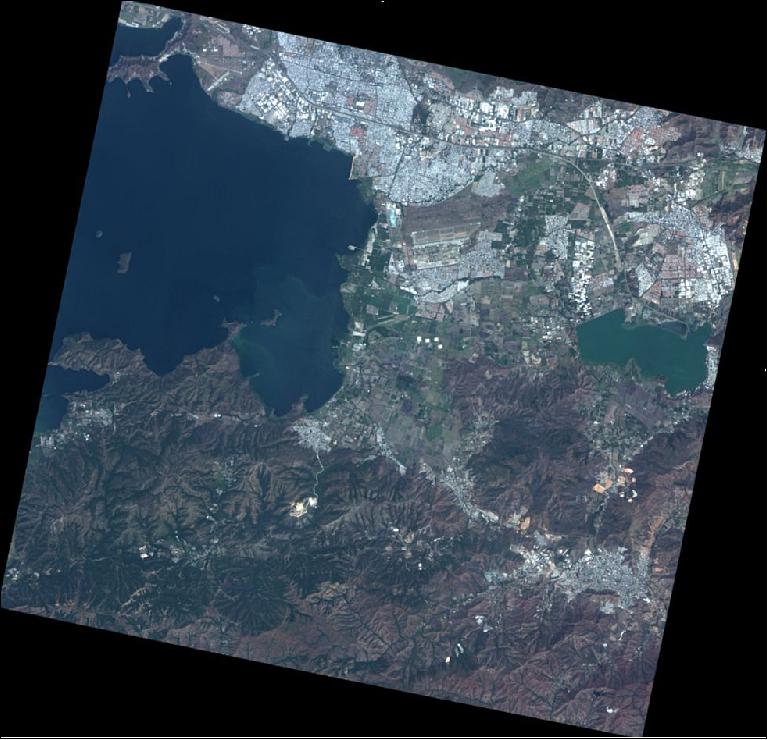 Figure 9: This multispectral image (10 m resolution, acquired on Feb. 8, 2015) shows a portion of the Valencia Lake, the second largest lake in importance of Venezuela after Lake Maracaibo and the body of fresh water without draining the greatest of Venezuela sea. It is set in a rift valley known as Graben of Valencia which lies between the Cordillera de la Costa and the mountainous interior. The endorheic basin is kind and covers 3150 km2. Lake Velencia covers a surface area of 344 km2. On its banks are located the cities Valencia and Maracay and other major urban centers as are Mariara, San Joaquin, Güigüe, Guacara and Palo Black (image credit: ABAE)