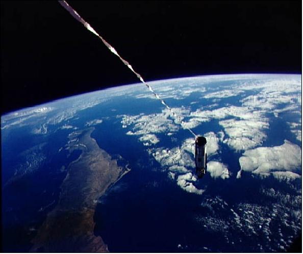Figure 1: A 30 m tether line connects the Agena Target Docking Vehicle with the Gemini-12 spacecraft (image credit: NASA)