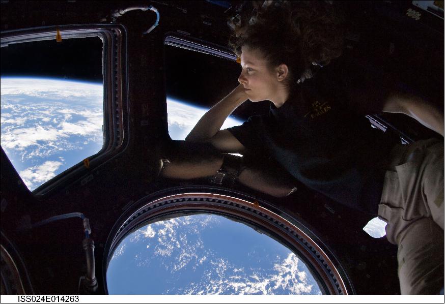 Figure 14: Astronaut Tracy Caldwell Dyson reflects in the Cupola of the ISS in Sept. 2010. The Cupola is a popular and inspiring hangout for the ISS crew, who enjoy taking photographs of Earth and space from its windows in their down time (image credit: NASA)