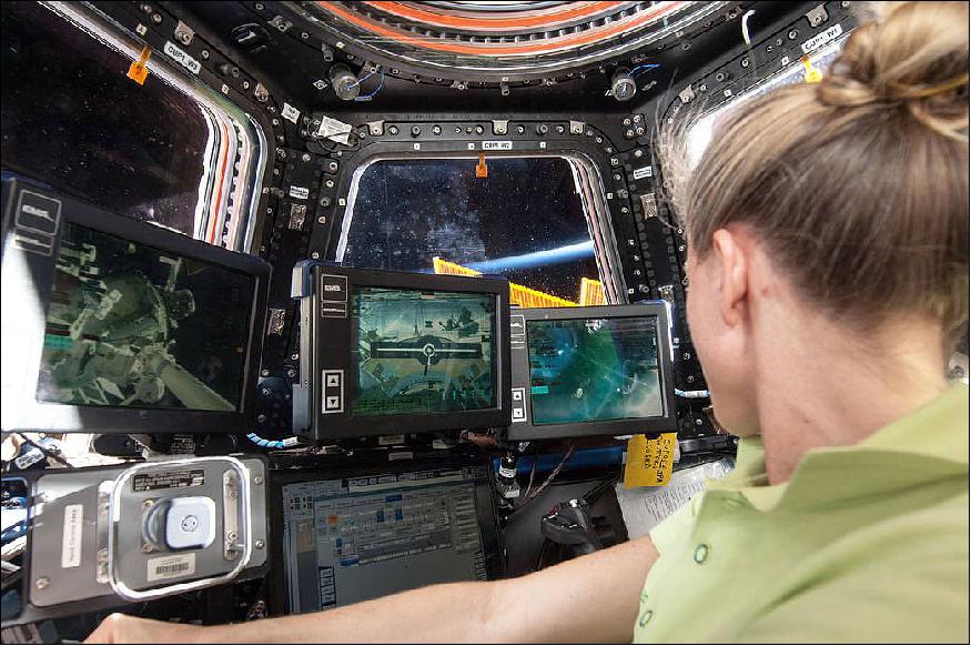 Figure 8: Photo of NASA astronaut Karen Nyberg at the robotics workstation in the Cupola (image credit: NASA)