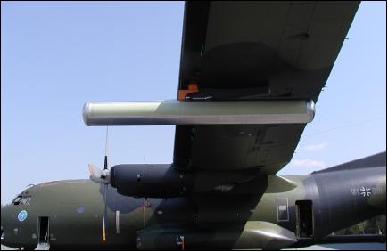 Figure 11: Photo of the PAMIR pod mounted to the wing of the Transall aircraft (image credit: FGAN/FHR, Ref. 16)