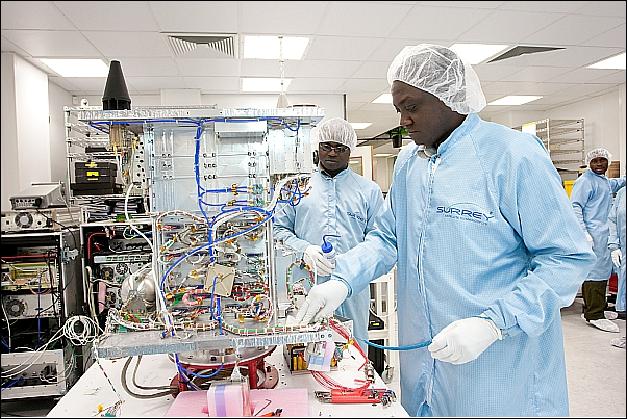 Figure 4: Photo of Nigerian engineers working on the NigeriaSat-X spacecraft (image credit: SSTL)