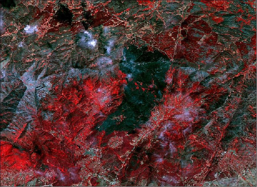 Figure 28: Recent (2009) forest fires in Arenas de San Pedro, Spain - false color image of the aftermath of the fire, with chlorophyl activity shown in red (image credit: Deimos)