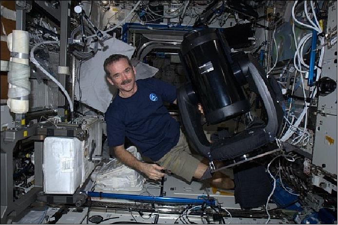 Figure 20: Canadian astronaut Chris Hadfield with the new ISERV Telescope in January 2013 (image credit: NASA)