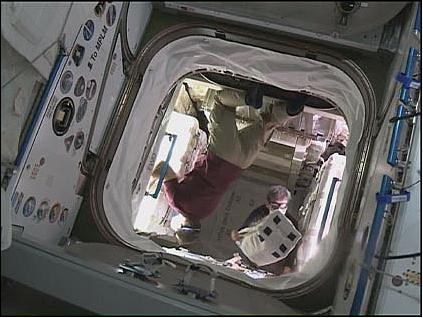 Figure 27: Photo of astronauts working in the PLC (image credit: JAXA, NASA)