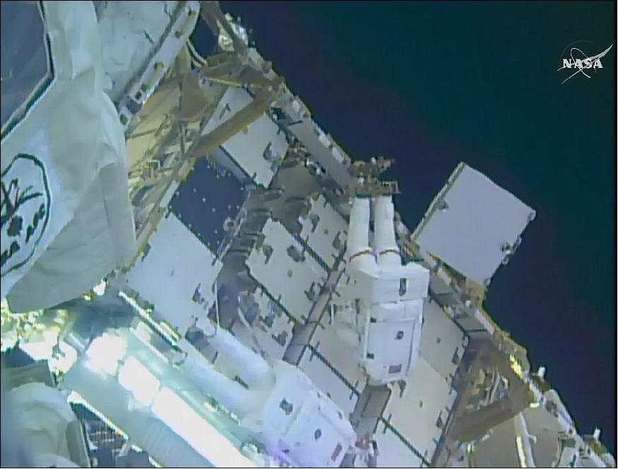 Figure 23: Kimbrough, top, and Whitson work to attach the adapter plates on the 3A power channel (image credit: NASA TV)