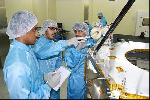Figure 11: EIAST engineers at the SI facility in Daejeon, Korea, inspecting the DubaiSat-2 spacecraft (image credit: EIAST)