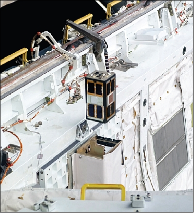 Figure 1: Photo of the PSSCT-2 nanosatellite as it is released from the launcher inside the Atlantis Space Shuttle bay (image credit: NASA)
