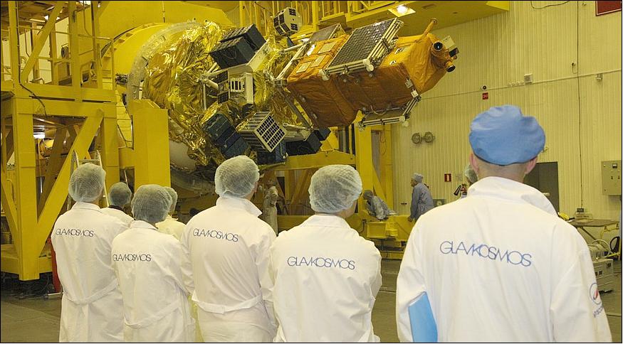 Figure 4: Engineers observe the integration of 72 smallsats that will launch on a Soyuz rocket from Baikonur (image credit: Glavkosmos)