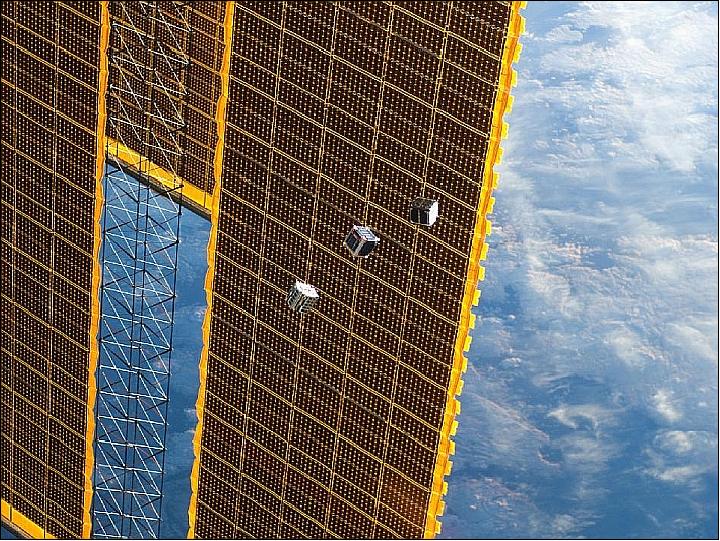 Figure 8: An Expedition 33 crew member captured this image as three CubeSats were released from the ISS with the solar array structure of the ISS in the background (image credit: NASA) 11)