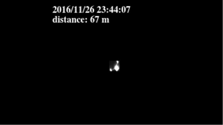 Figure 13: This image was acquired on Nov. 26, 2016 at a distance of 67 m from the BEESAT-4 CubeSat. The CubeSat is reflecting sunlight, which makes it extremely bright. The CubeSat and its two antennas are clearly visible. While BIROS is about the size of a washing machine with a mass of 130 kg, the CubeSat has an edge length of just 10 cm (image credit: DLR)