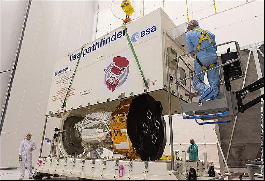 Figure 10: On Oct. 9, 2015, the LISA Pathfinder transport container is being opened in the high bay of the EPCU (Ensemble de Préparation de la Charge Utile) S5C building at the Centre Spatial Guyanais, in Kourou (image credit: ESA-CNES-Arianespace / Optique Vidéo du CSG - G. Barbaste) 30)
