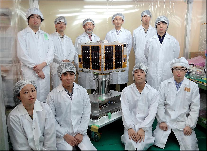 Figure 8: Photo of the Rising-2 research team at SRL (Space Robotics Laboratory)with their microsatellite (image credit: Tohoku University)