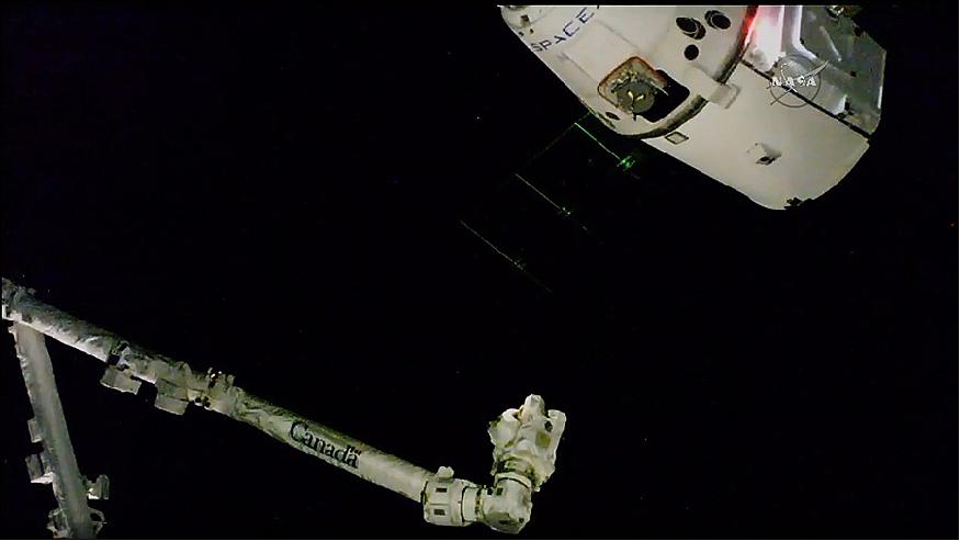 Figure 9: The Dragon resupply ship is pictured just 10 meters away from the space station's Canadarm2 (image credit: NASA TV)