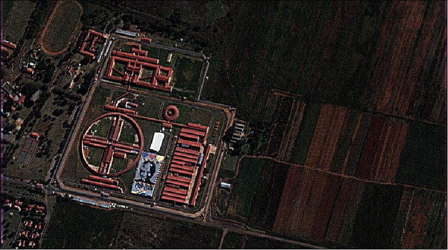 Figure 7: On 4 April 2018, the Carbonite-2 VividX2 satellite captured full-color video footage of a large mural celebrating the life of Nelson Mandela, created by 106 men at Zonderwater Correctional Center. The impressive mural, made from many individual blankets stitched together, is clearly visible from space. The project was initiated by 67 Blankets, a campaign which works in unison with Nelson Mandela Day to introduce crocheting into the curriculum of correctional services (image credit: Earth-1)