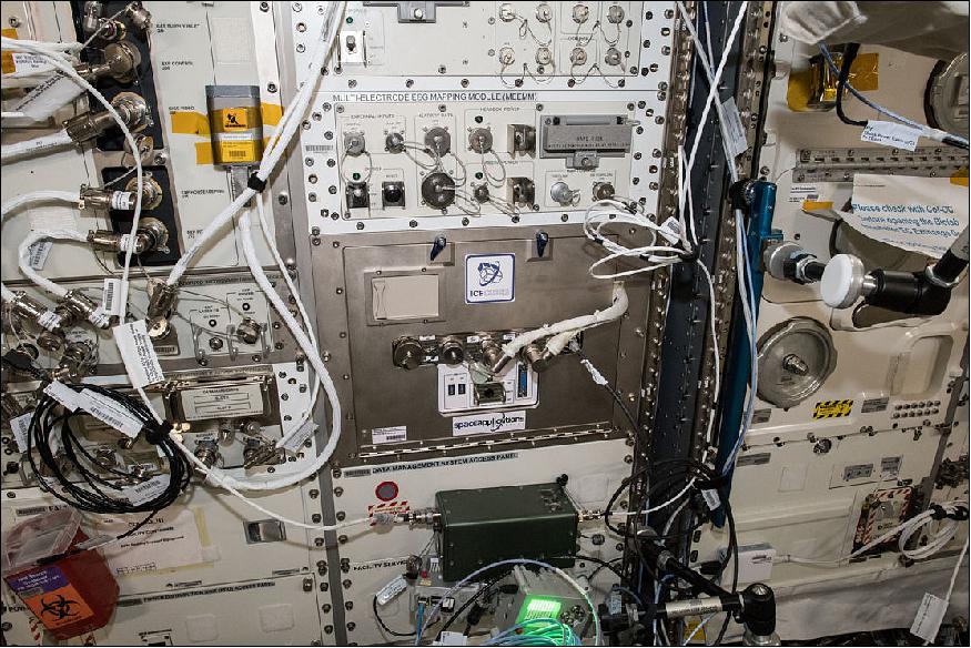 Figure 4: ICE Cubes in Columbus: The ICE Cubes facility is housed in the Columbus module of the International Space Station. The rack can accommodate 12 cubes on top and two rows of four cubes below (image credit: ESA/NASA) 16)