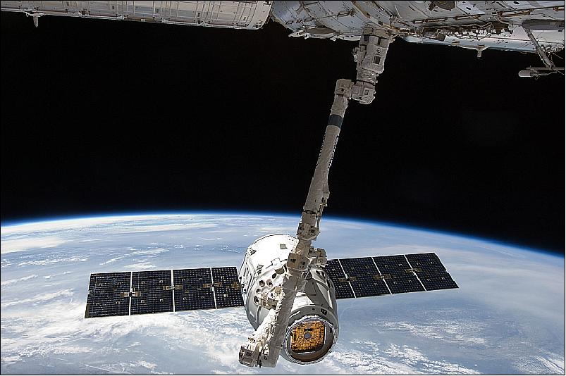 Figure 6: Photo from the ISS of the Dragon spacecraft on May 25, 2012 as Canadarm2 grapples Dragon to berth it to a port on the ISS (image credit: NASA)