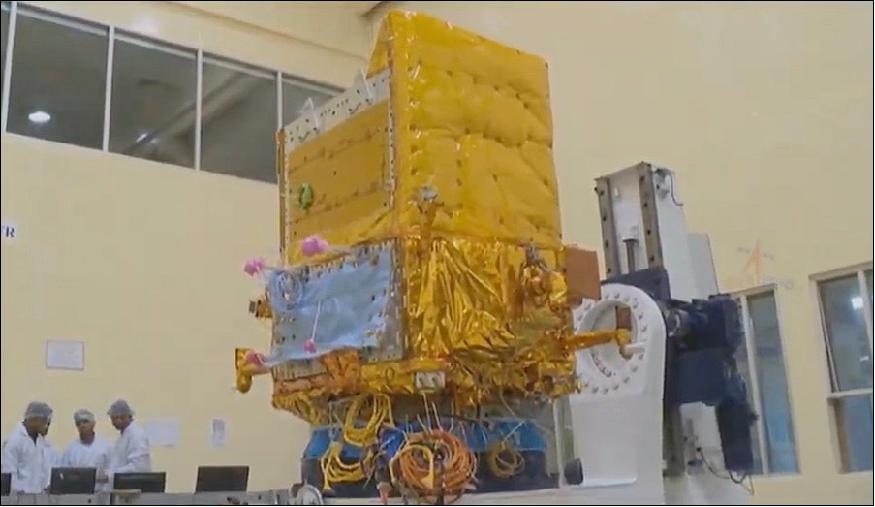 Figure 1: A frame from the live broadcast of the PSLV launch showed EMISat in a clean room before its mounting atop the PSLV (image credit: ISRO/Doordarshan TV)