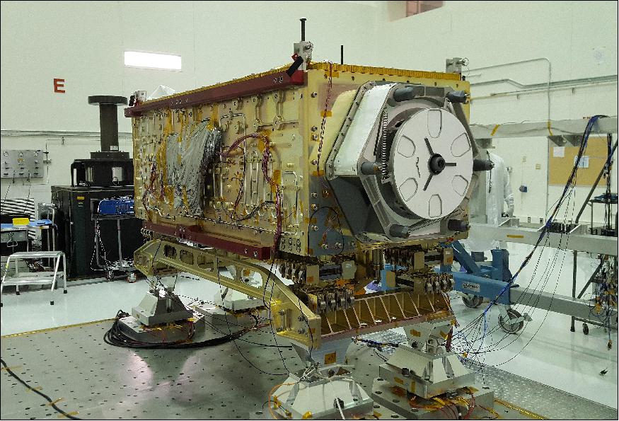 Figure 2: OCO-3 sits on the large vibration table (known as the 'shaker') in the Environmental Test Lab at the Jet Propulsion Laboratory. The exposed wires lead to sensors used during dynamics and thermal-vacuum testing. Thermal blankets will be added to the instrument at Kennedy Space Center, where a Space-X Dragon capsule carrying OCO-3 will launch in on a Falcon 9 rocket to the space station on May 1, 2019 (image credit: NASA/JPL-Caltech) 3)
