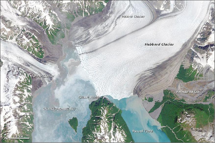Figure 90: Advancement of Alaska's Hubbard Glacier into the Disenchantment Bay acquired on July 13, 2002 with the ETM+ instrument on Landsat-7 (image credit: NASA Earth Observatory, USGS, Joshua Stevens)