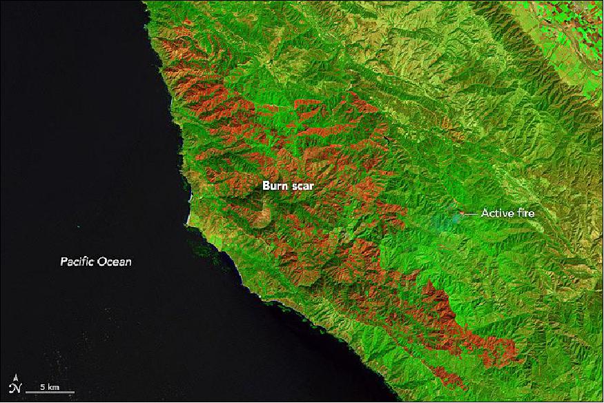 Figure 67: False color image of OLI on Landsat-8 which combines shortwave infrared, near-infrared, and green light to provide a clear view of the charred landscape (dark red). The main area of active fire (bright red), which is nestled amid unburned vegetation (green), is small by comparison (NASA Earth Observatory, image by Jesse Allen using data from USGS)