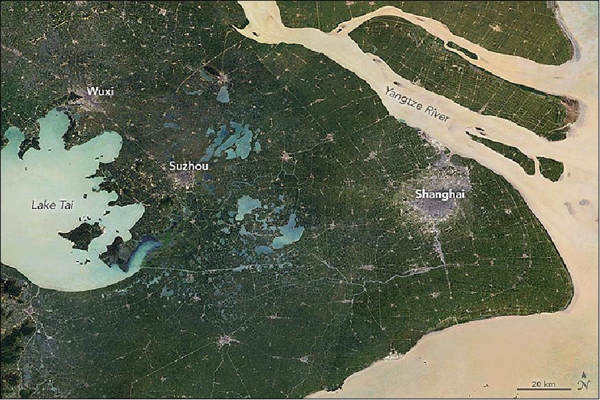Figure 48: China's metropolitan region of Shanghai observed with TM on Landsat-5 in 1984 (image credit: NASA Earth Observatory mosaics by Joshua Stevens and Jesse Allen using Landsat data from the USGS, caption by Adam Voiland)