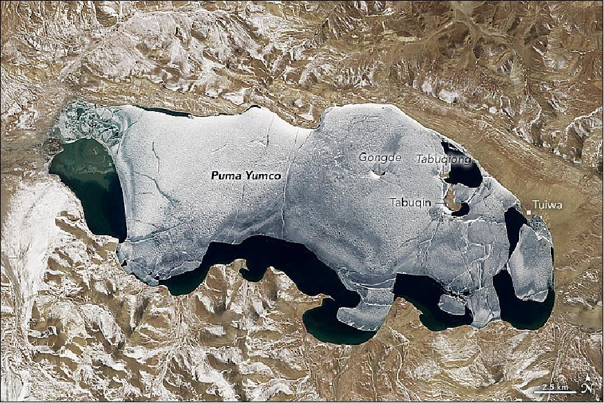 Figure 47: Landsat-8 image of the mostly ice-coverd lake Puma Yumco on the Tibetan Plateau, acquired with OLI on March 13, 2017 (image credit: NASA Earth Observatory, image by Jesse Allen, using Landsat data from the USGS, caption by Adam Voiland)