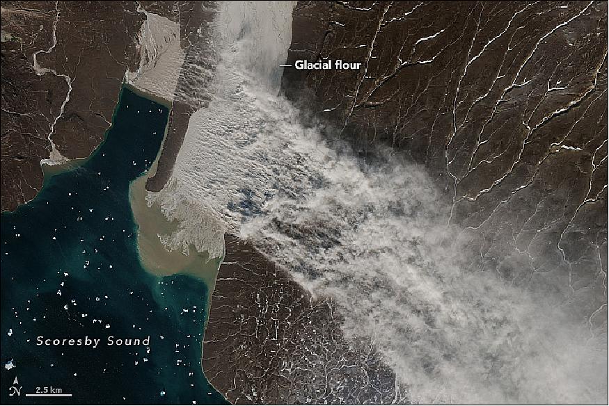 Figure 20: The Copernicus Sentinel-2 satellite of ESA collected imagery on September 29, 2018, of a sizable silt plume streaming from Greenland's east coast. Northwesterly winds on September 29 were strong enough to lift glacial flour into the air (image credit: NASA Earth Observatory image by Joshua Stevens, using Copernicus Sentinel data (2018) processed by the European Space Agency. Story by Adam Voiland)
