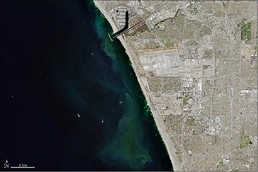 Figure 14: OLI on Landsat-8 acquired a natural-color image of Santa Monica Bay on October 10, 2015, midway through the shutdown. The green patches near the coast are phytoplankton blooms likely caused by an excess of nutrients from the nearshore wastewater discharge (image credit: NASA Earth Observatory)