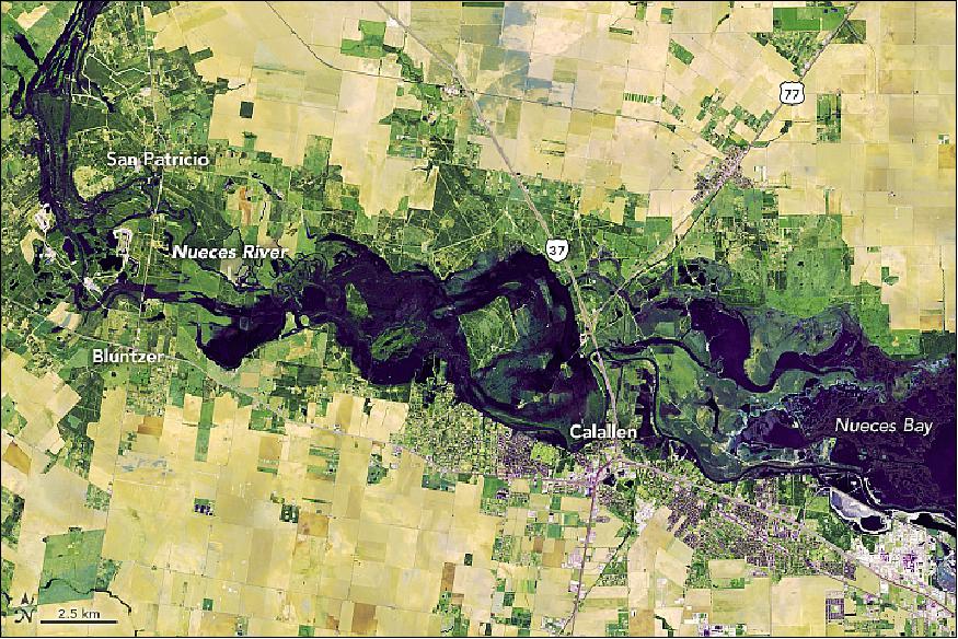 Figure 12: On 1 November 2018, OLI on Landsat-8 captured a false-color view (bands 7-6-4) of flooding along the Nueces River near Calallen. At the time, a stream gauge in nearby Mathis showed the river had risen to 9 m putting it 1 m above flood stage (image credit: NASA Earth Observatory, image by Joshua Stevens, using Landsat data from the U.S. Geological Survey, story by Adam Voiland)