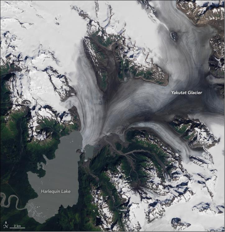 Figure 9: The TM (Thematic Mapper) instrument on Landsat-5 acquired this image of the Yakutat Glacier on August 22, 1987 (image credit: NASA Earth Observatory, image by Lauren Dauphin and Robert Simmon, using Landsat data from the U.S. Geological Survey. Story by Adam Voiland)