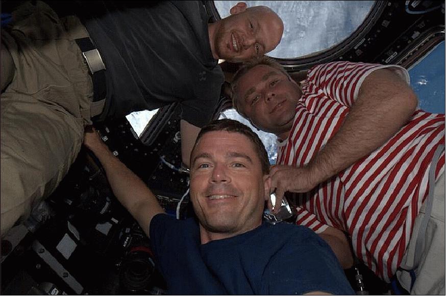 Figure 58: Expedition 40/41 crew pose for a selfie in Europe's Cupola observatory in the ISS. From front to back: NASA astronaut Reid Wiseman, Roscosmos commander Maxim Suraev and ESA astronaut Alexander Gerst (image credit: NASA, ESA) 62)