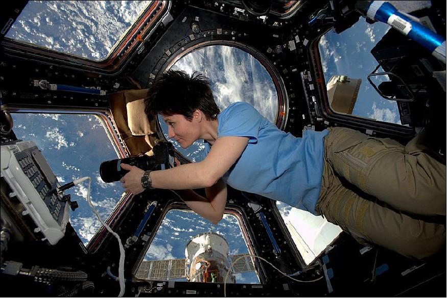 Figure 34: Photo of ESA Astronaut Samantha Cristoforetti in the Cupola of the ISS taking snapshots of breathtaking Earth (image credit: ESA, NASA)