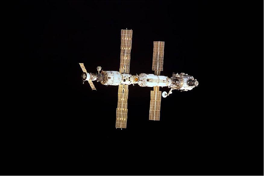 Figure 90: This Dec. 2, 2000, photograph shows the configuration of the space station at the start of Expedition 1 including the Zarya Control Module, Unity Node, Zvezda Service Module and Z1-Truss. It was taken by STS-97 crewmembers aboard shuttle Endeavour during approach to dock with the station on a mission to deliver and connect the first set of U.S.-provided solar arrays, prepare a docking port for arrival of the U.S. Laboratory Destiny and perform additional station assembly tasks. The Expedition 1 crew spent four months living and working on the station and returned to Earth aboard shuttle Discovery on March 21, 2001 (image credit: NASA)