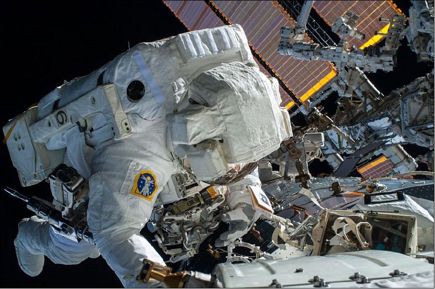 Figure 28: NASA astronaut Terry Virts pictured on 21 Feb. 2015, during the first of three ISS spacewalks being conducted by the Expedition 42 crew; Virts is seen working to complete a cable routing task while near the forward facing port of the Harmony module on the ISS (image credit: NASA ,ISS042E283139)