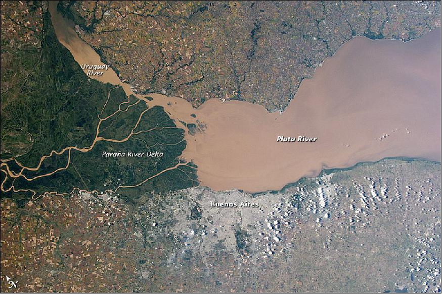 Figure 19: Photo of the Plata River (south coast: Argentina; north cost: Uruguay), acquired on April 6, 2015 with a Nikon D4 digital camera using a 50 mm lens. The image has been cropped and enhanced to improve contrast, and lens artifacts have been removed (image credit: NASA Earth Observatory, Expedition 43 crew)
