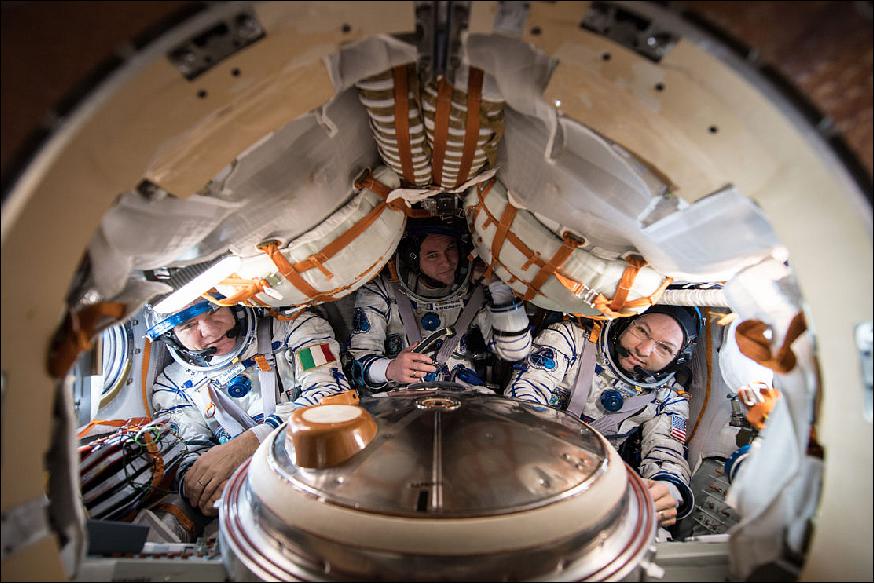 Figure 3: ESA astronaut Paolo Nespoli (left) and crewmates Randy Bresnik of NASA (right) and Sergei Ryazansky of Roscosmos in their Soyuz MS-05 spacecraft wearing their Sokol launch and entry suits. The veteran space travelers were preparing for their return to Earth after 139 days in space (image credit: ESA, NASA) 4)