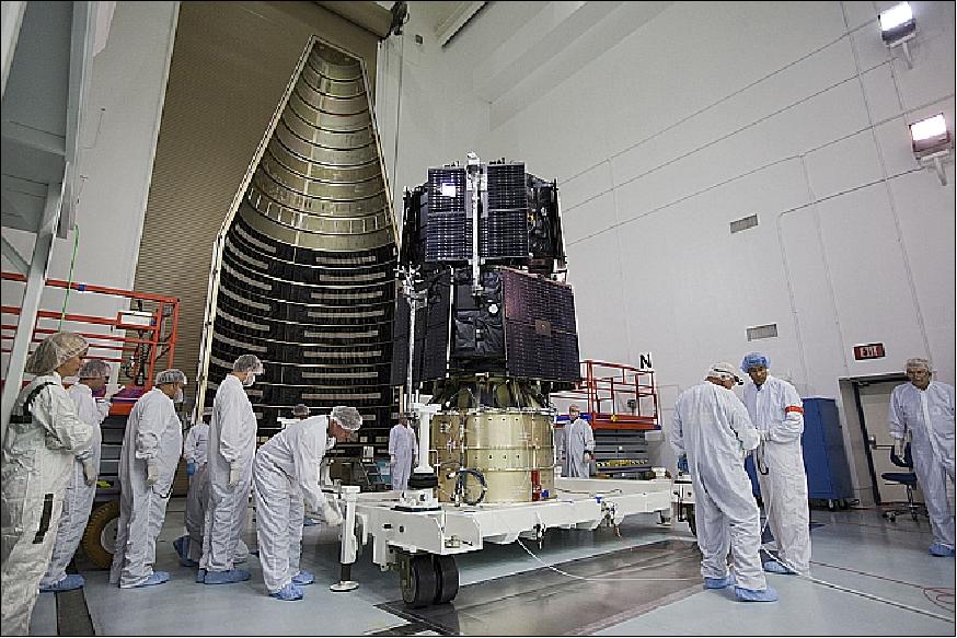Figure 11: Technicians at the Astrotech payload processing facility prepare the RBSP spacecraft for encapsulation in the payload fairing (image credit: NASA)