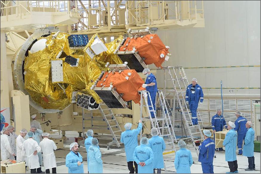Figure 6: This picture shows the cluster of 28 satellites, some contained inside deployment mechanisms, attached to the Soyuz rocket’s Fregat upper stage before encapsulation into the payload fairing (image credit: Glavkosmos)
