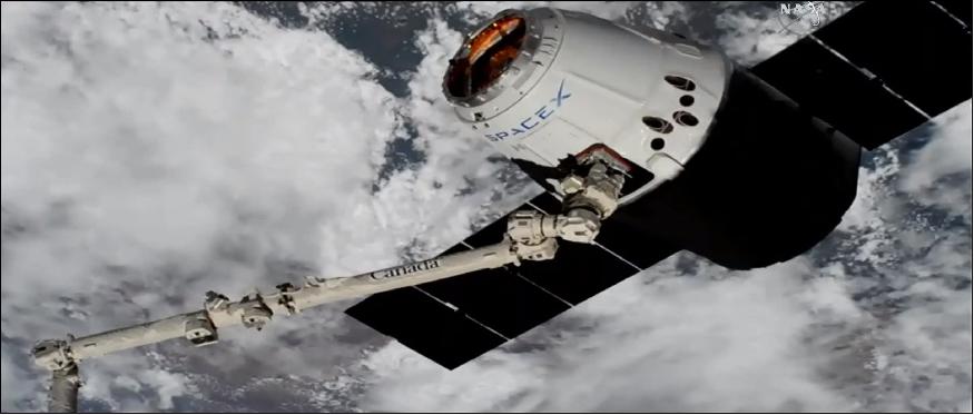 Figure 38: Astronauts aboard the ISS snagged the uncrewed Dragon today (April 4) at 10:40 GMT using the orbiting lab's huge Canadarm2 robotic arm (image credit: NASA TV)