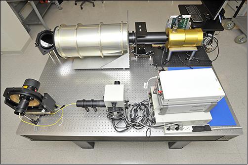 Figure 5: Flight-like hardware subsystems for SensorSat were integrated and tested as part of a system capability demonstration. Seen here is the imaging system, which consists of a Lincoln Laboratory–developed CCD imager, camera electronics, a custom lens cell, and a state-of-the-art lightweight baffle (image credit: MIT/LL)