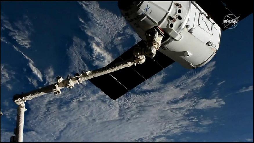 Figure 7: The SpaceX Dragon is in the grips of the Canadarm2 robotic arm shortly after it was captured over southern Chile (image credit: NASA)