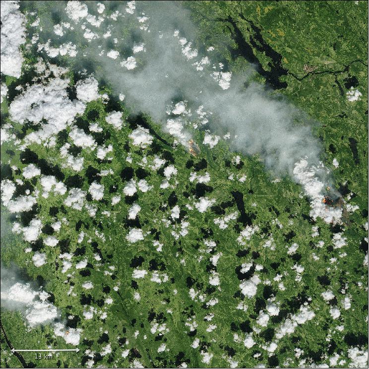 Figure 10: The closer view was captured on the same day (17 July) by Sentinel-2. Here, flames and smoke from two of the fires can be seen clearly, along with smoke from other fires in the vicinity (image credit: ESA, the image contains modified Copernicus Sentinel data (2018), processed by ESA)